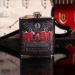 AC/DC hip flask,AC/DC Black Ice hip flask,officially licensed AC/DC gift,rock band hip flask UK,music fan hip flask,AC/DC festival accessory,band merchandise hip flask