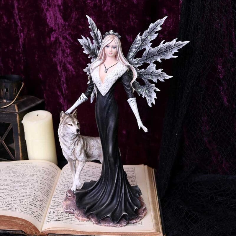 fairy and wolf figurine