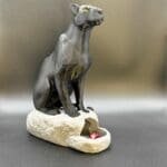 il_fullxfull.6673123713_t451.jpg a black panther statue dice tower