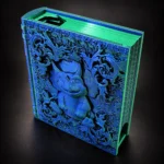 Blue book with creature carving
