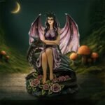 d7396a26-7.jpg fairy and dragon figurines