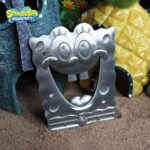 SpongeBob SquarePants bottle opener,SpongeBob bottle opener UK,SpongeBob gifts for adults,SpongeBob kitchen accessories,novelty bottle opener UK,magnetic bottle opener fridge,SpongeBob bar accessories,SpongeBob merchandise UK,funny bottle opener gift UK,retro cartoon gifts UK
