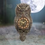 Steampunk owl clock with gears.