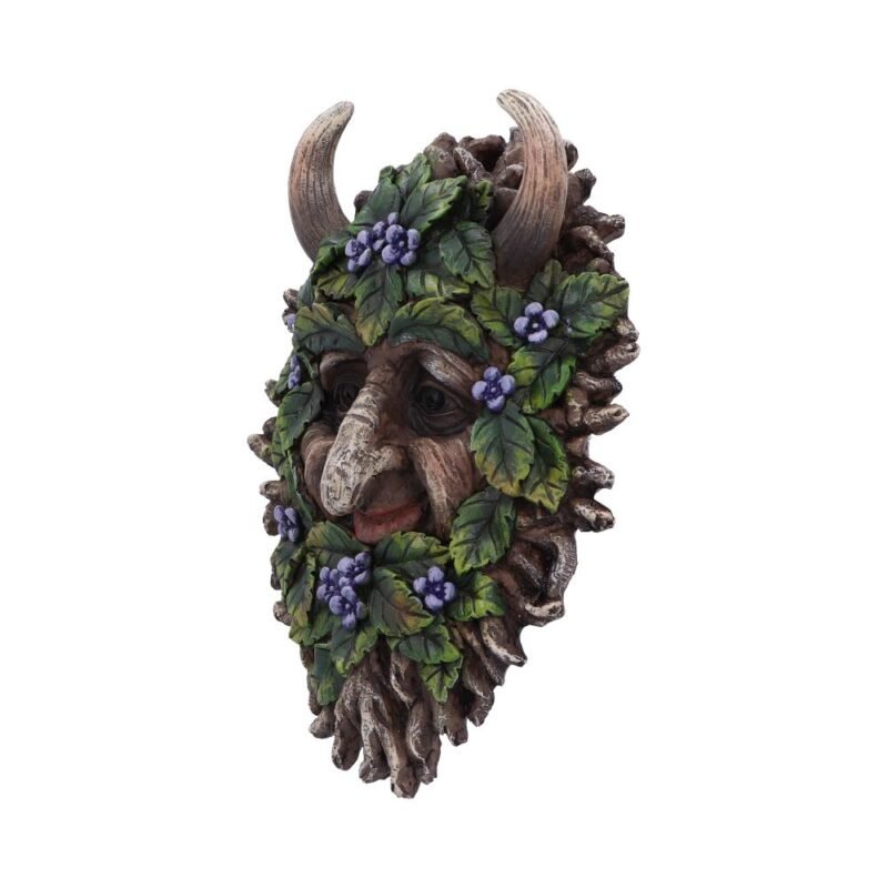 Green man face sculpture