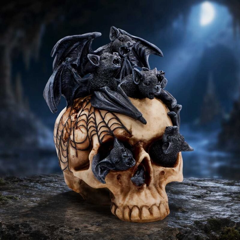 Bats on skull figurine