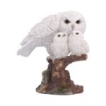 u7854c26.jpg Snowy owl family sculpture on branch