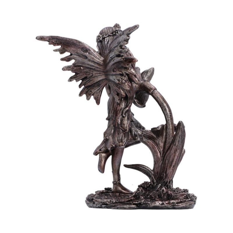 Fairy figurine with wings and flower.