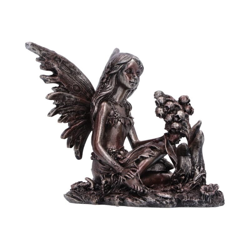 Fairy figurine with floral accents.