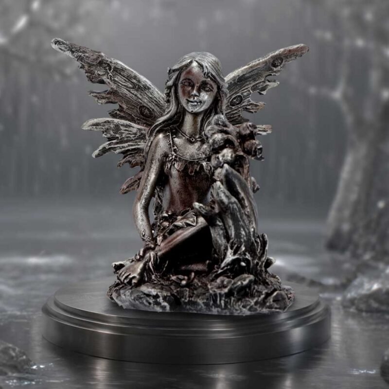 Fairy figurine on dark display.