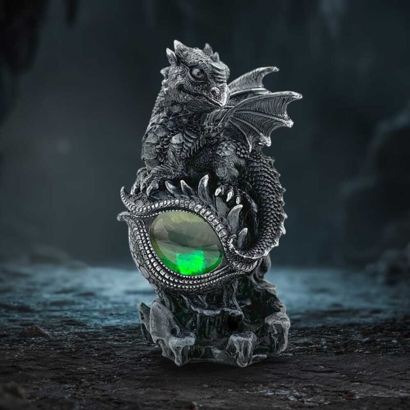 Dragon statue with green gem